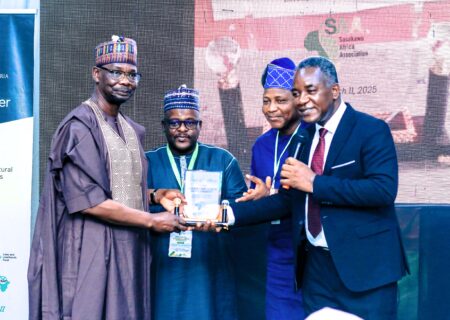 Governor Sule receiving the award from the Country Director, SAA Nigeria, Dr Godwin Atser.